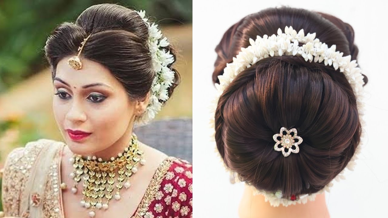 What a beautiful large low bun with real flower gajra & juda pin! Care  however should be taken before adopting such … | Bridal hair buns, Bridal  bun, Bun hairstyles